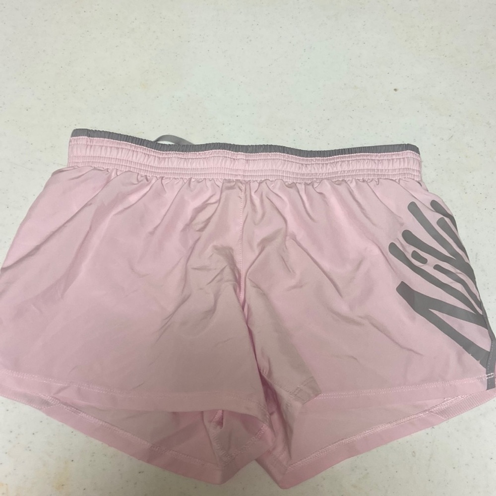 Baby pink Nike shorts